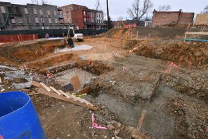 excavator digs foundation in new opportunity zone