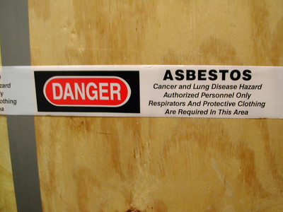 asbestos sign neglected maintenance