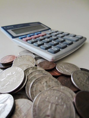 calculator and coins VP of Finance