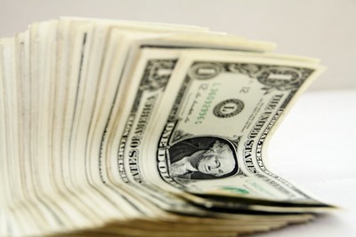 stack of dollar bills low financial value